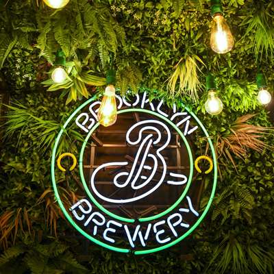Brookly Brewery neon sign in foliage
